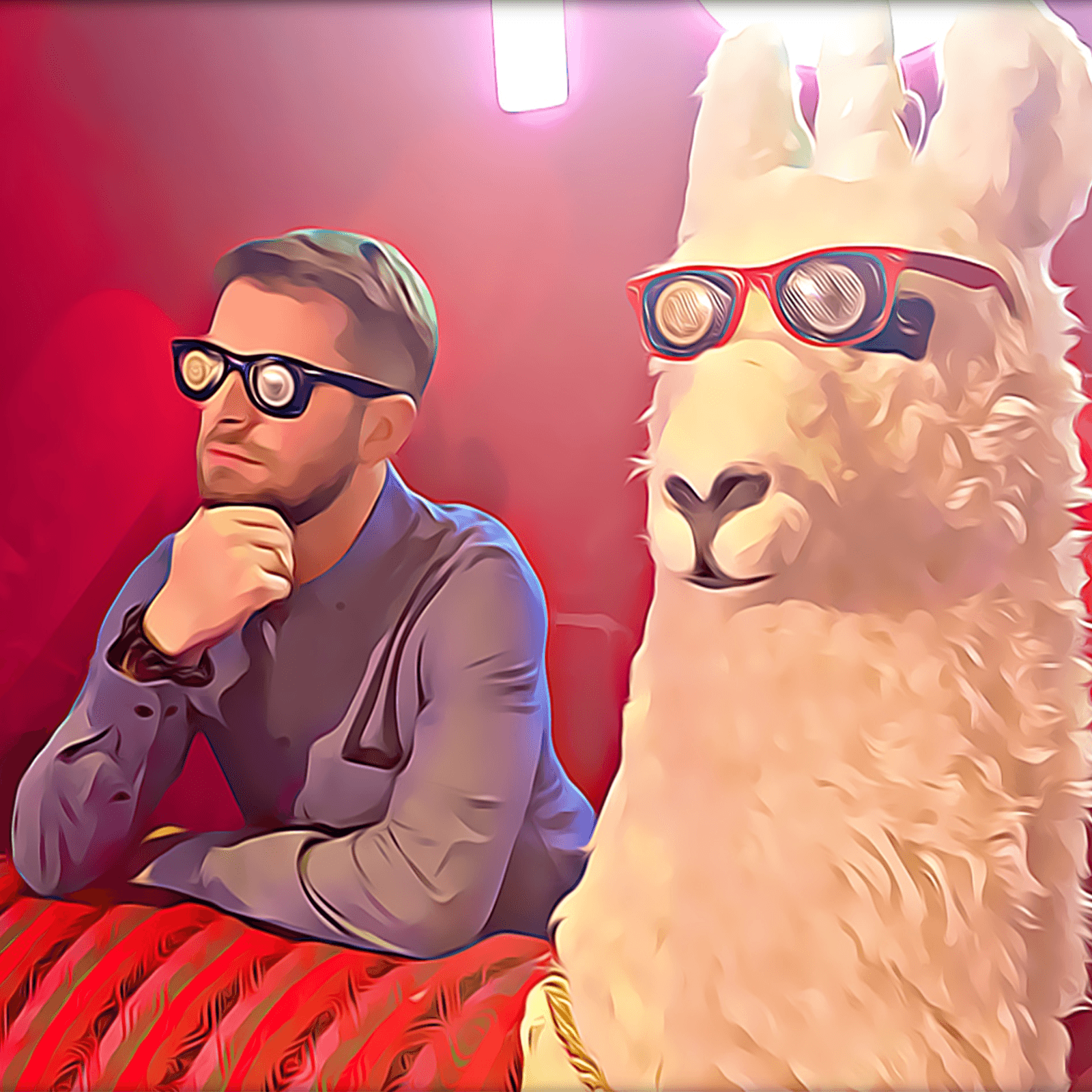Coder Dan with a llama, both wearing glasses